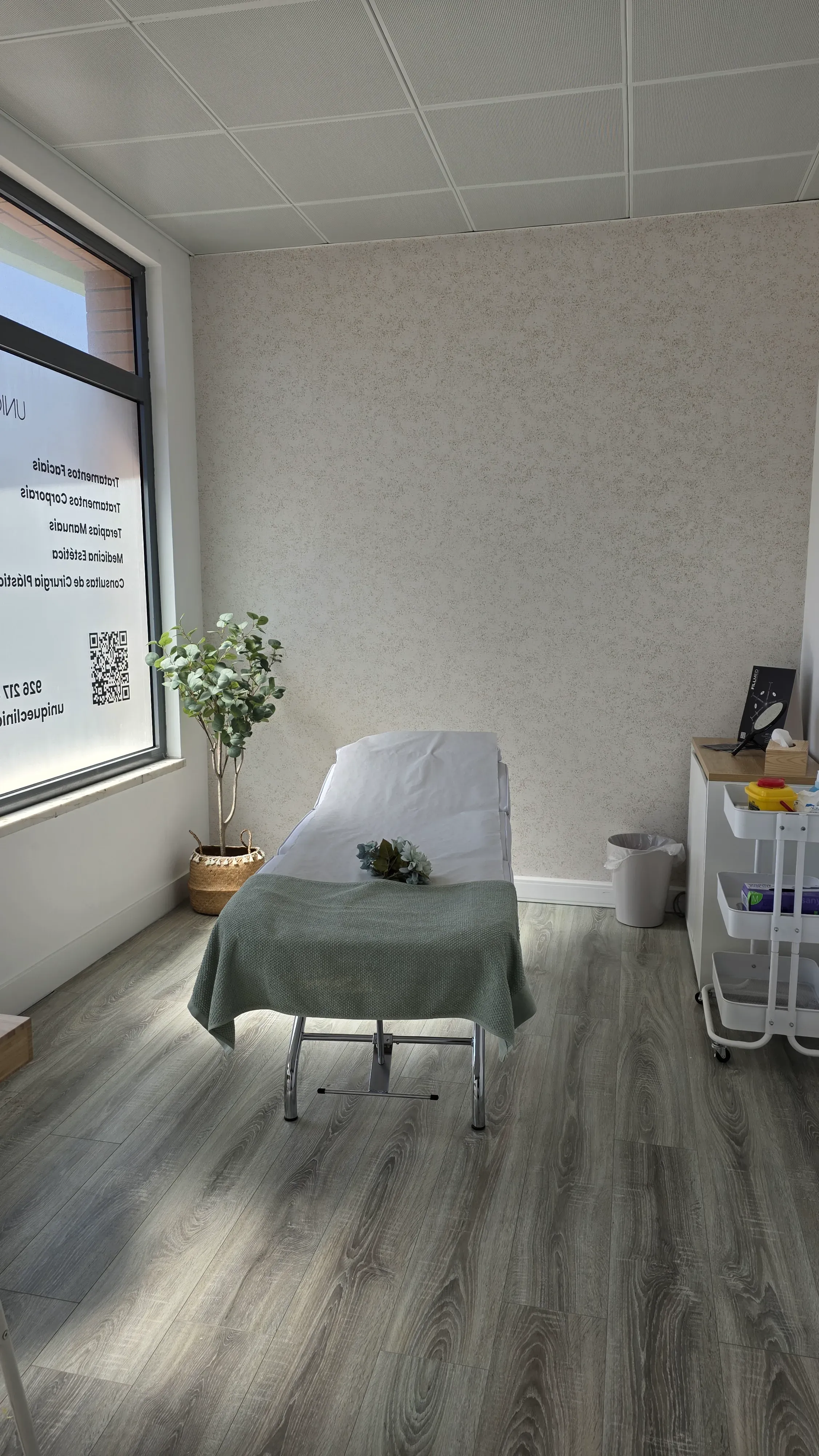 ramada treatment room with bed and sign